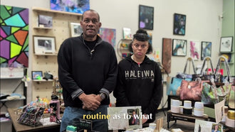 Crystal standing with a man in the Blissful Seeds shop, surrounded by artwork and bags